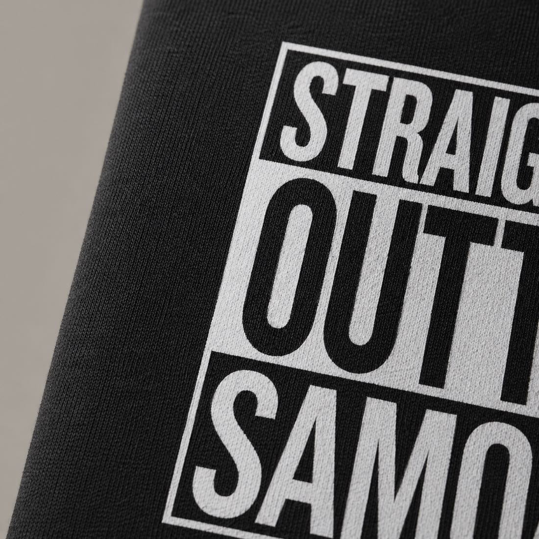 Heavy unisex T-shirt featuring "Straight Outta Samoa" design by The Print Bar, casual fit, in black color.