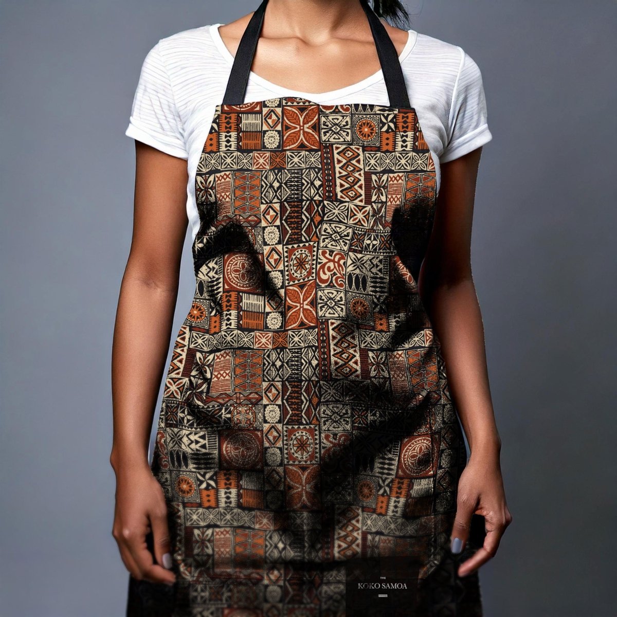 Black Colorway apron with Elei print, one size, suitable for AU, NZ, and USA kitchens, featuring vibrant tropical patterns.