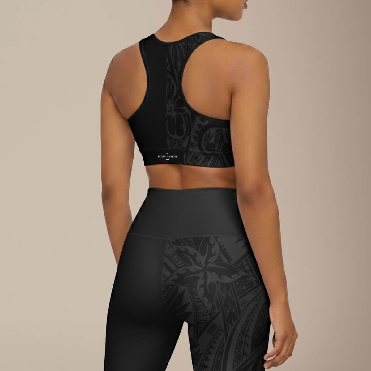 FYBY seamless sports bra in Bloom Dark with black stitching, designed for active wear, shown on a plain background.