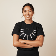 Heavy unisex T-shirt by Ula Nifo featuring traditional Samoan design, with bold graphic art on front.