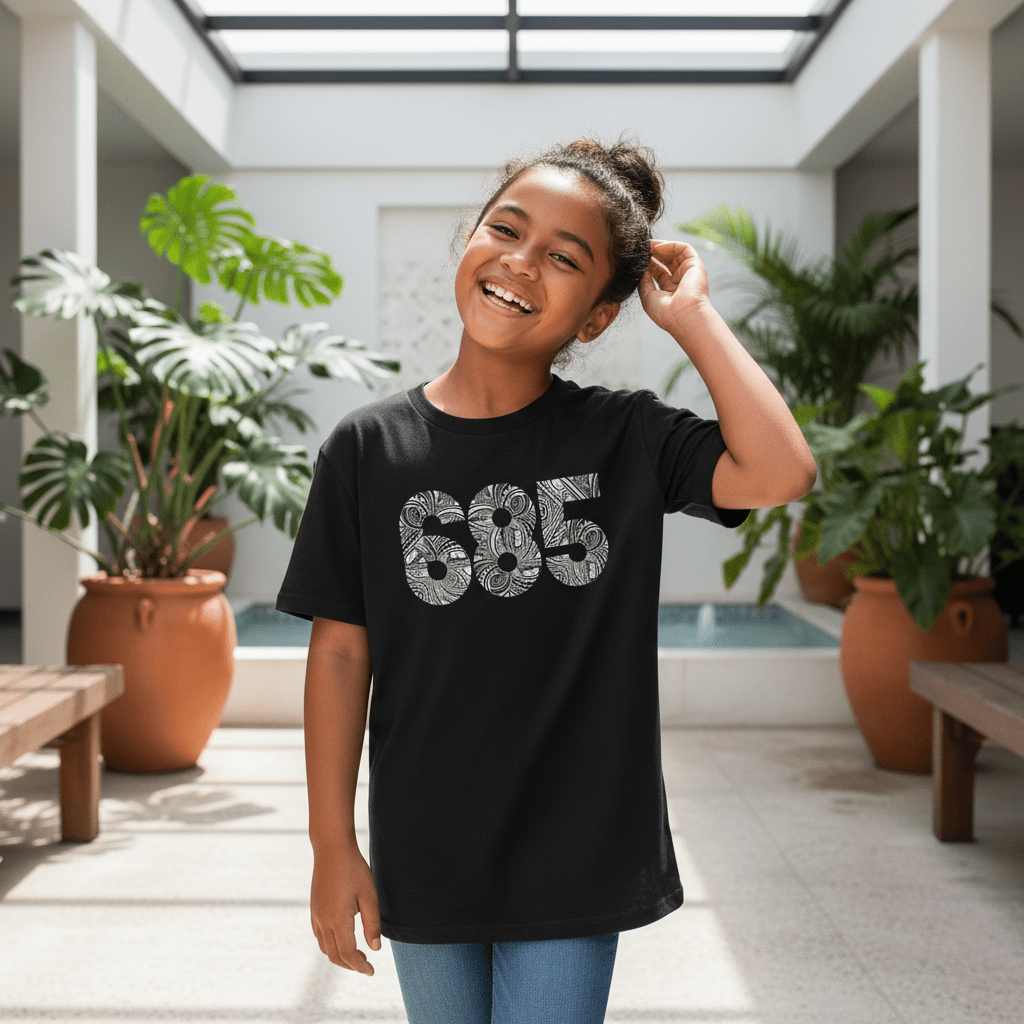 Kids unisex tee by The Print Bar featuring a colorful tropical Koko Samoa design, suitable for boys and girls.