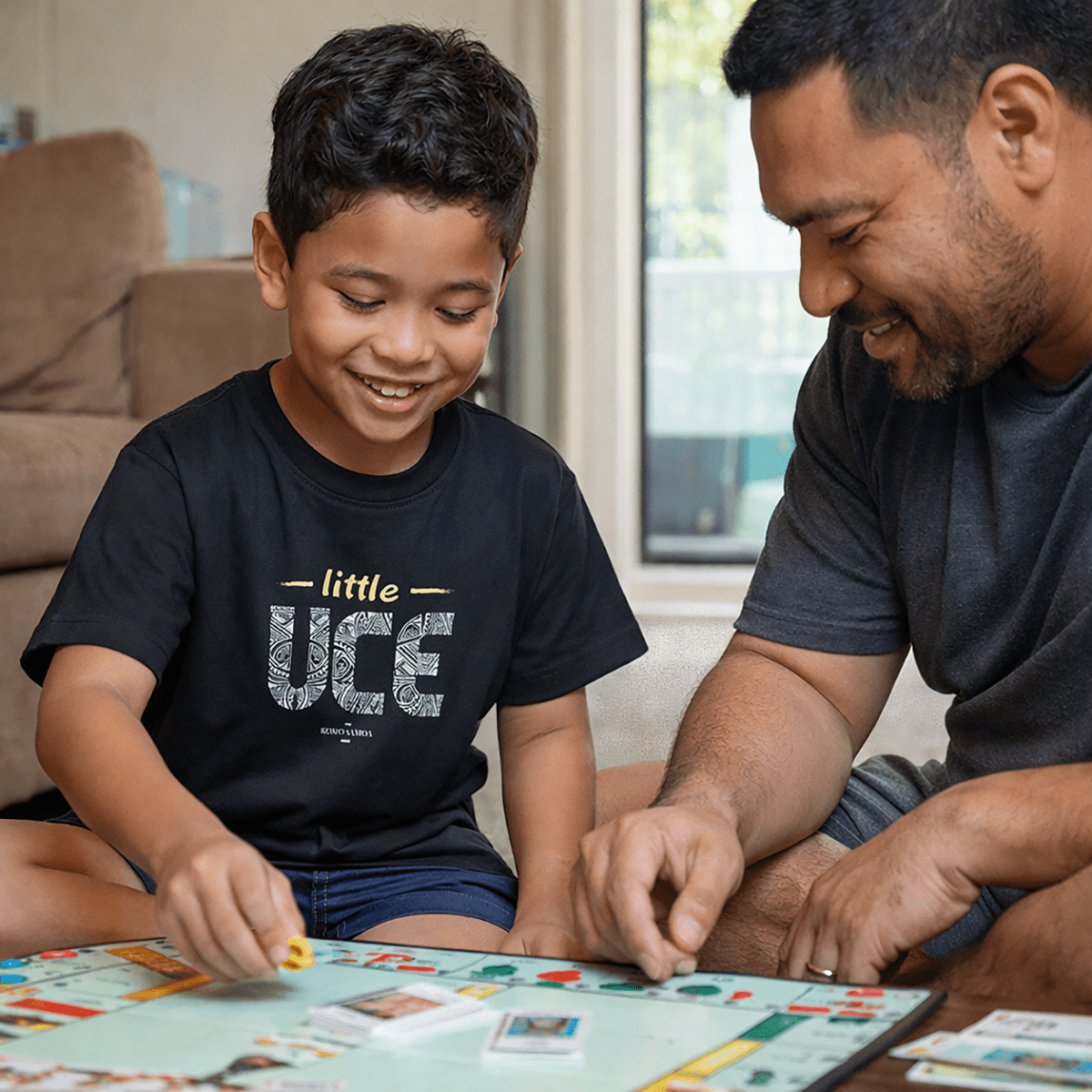 Kids unisex tee from The Print Bar featuring Little Uce design, casual kids' T-shirt in vibrant colors.