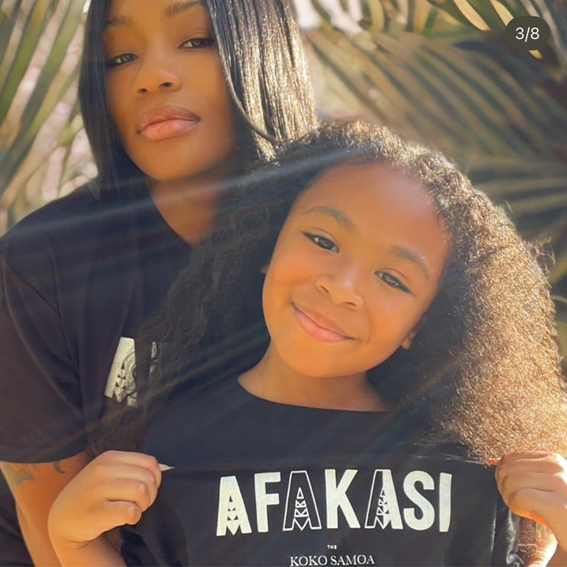 Kids unisex navy T-shirt featuring a monster digital design, from The Print Bar's Afakasi kids tees collection.