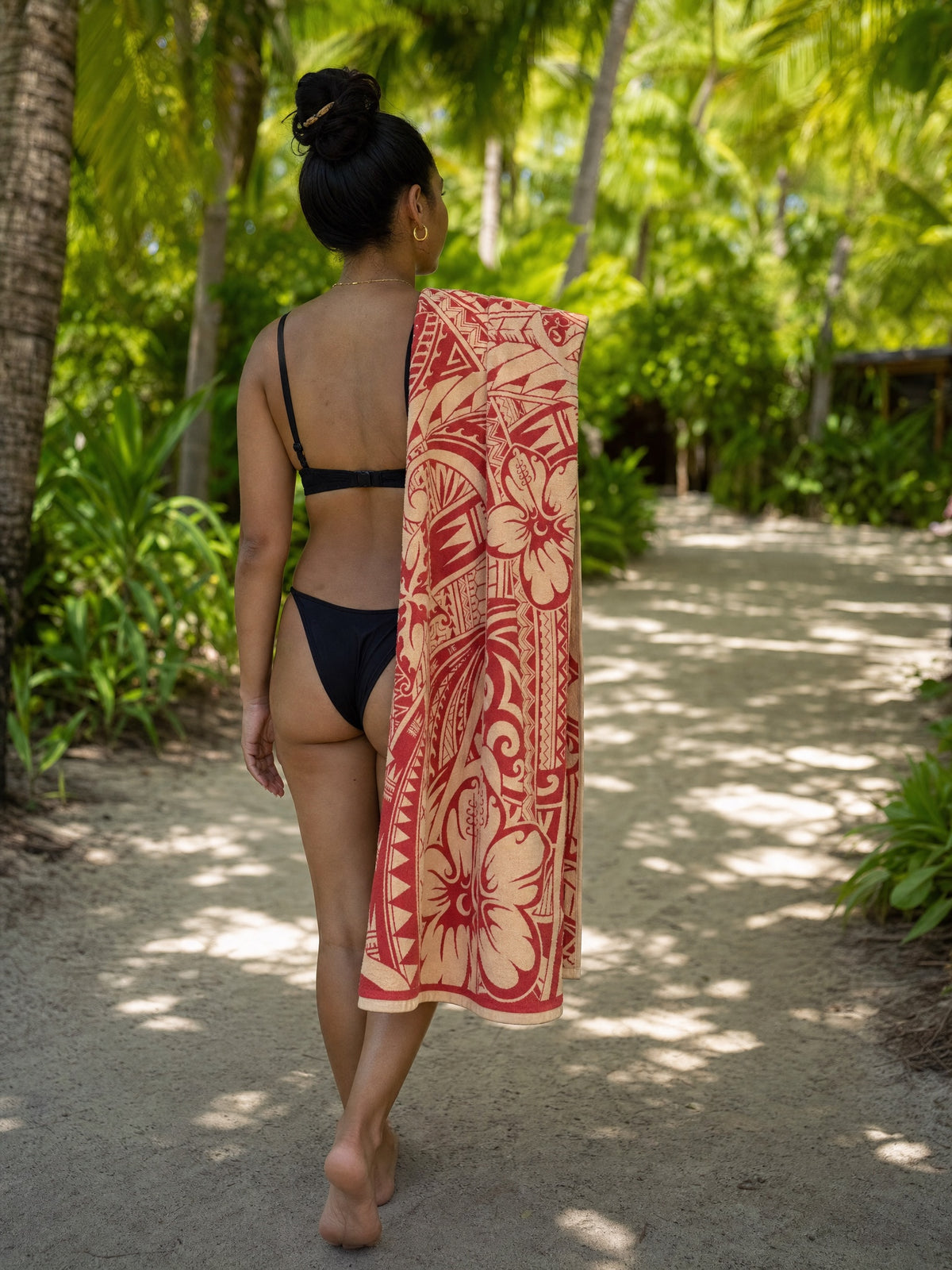 Bloom Poppy beach towel in use