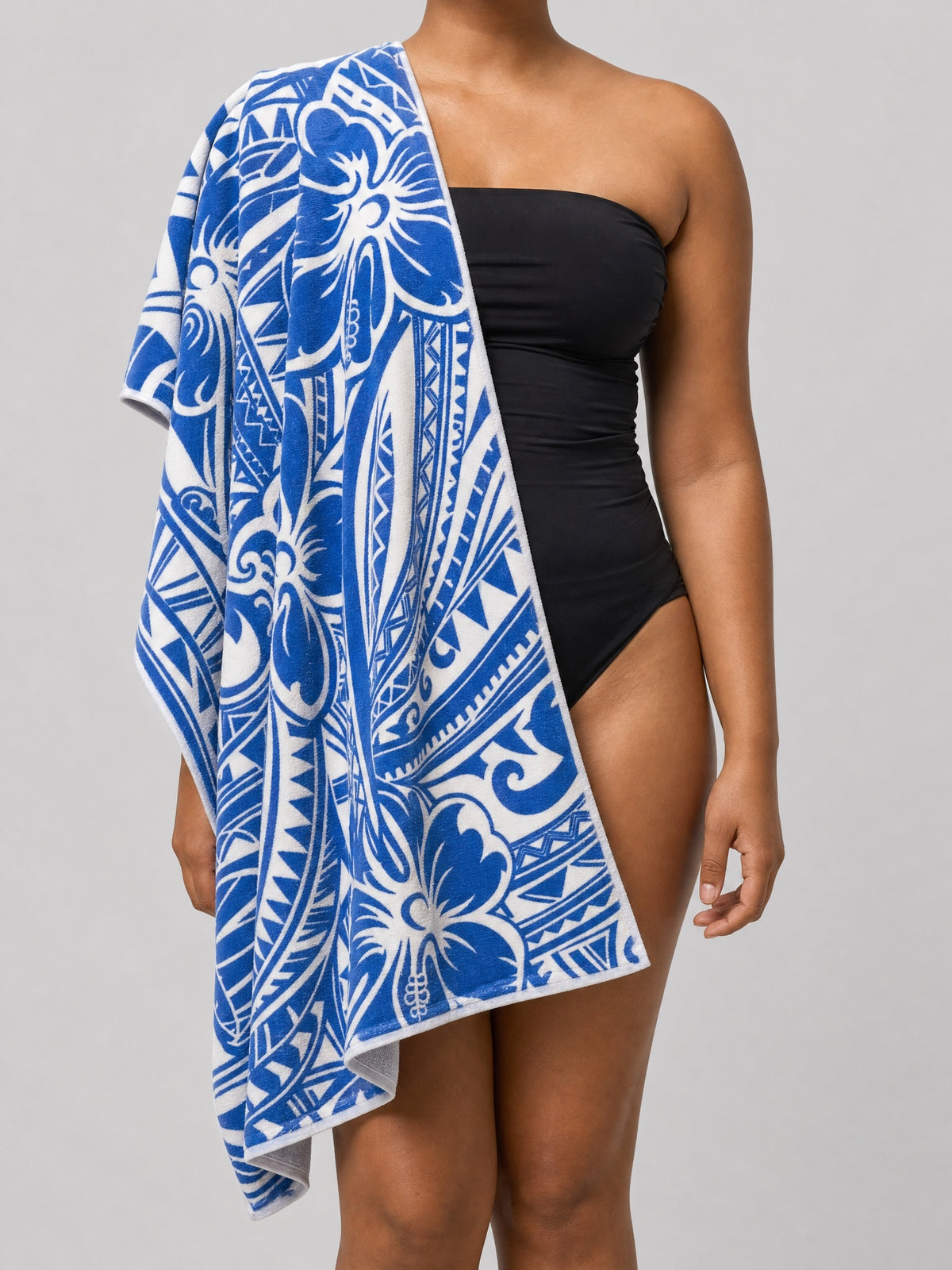 Beach Towel - Bloom on a light grey studio background