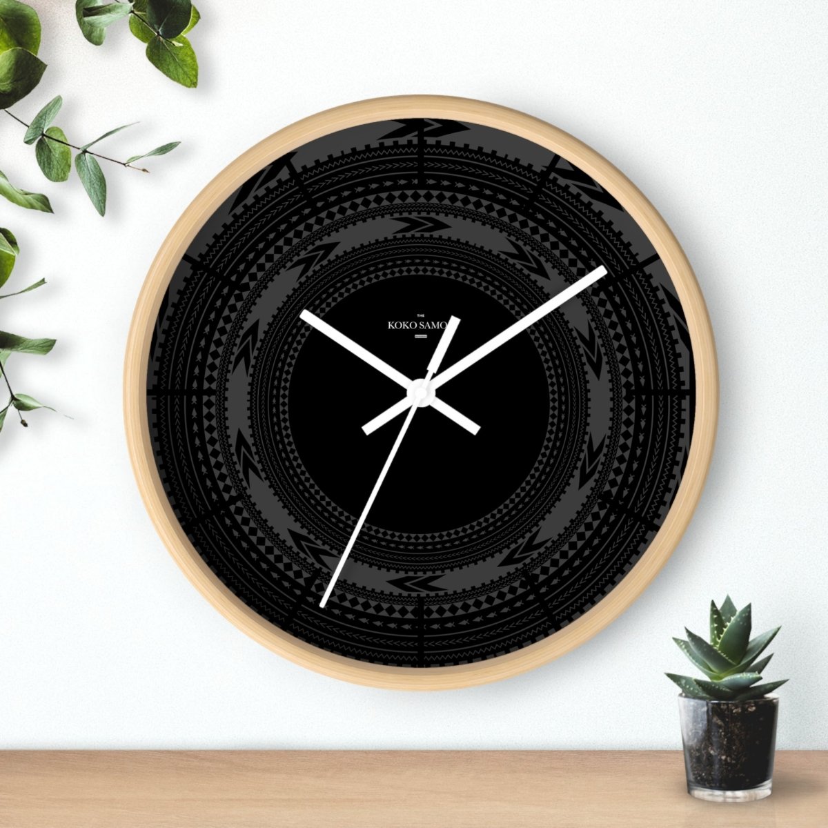 Black 10-inch wall clock with a sleek Pe'a, perfect for home decor in AU, NZ, and USA.