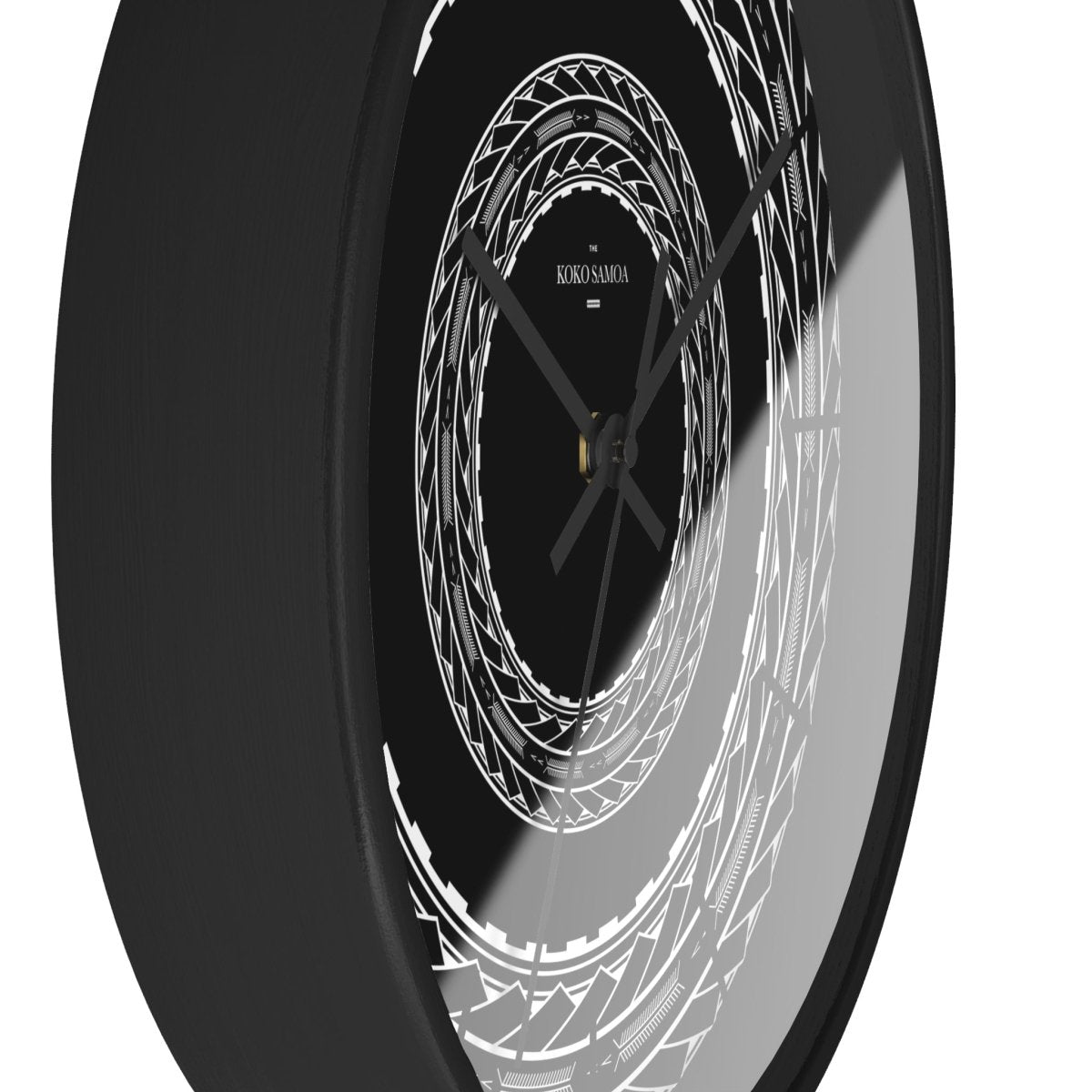 Black 10-inch wall clock with Samoan arrows design, featuring a sleek black base, perfect for home decor in AU, NZ, and USA.