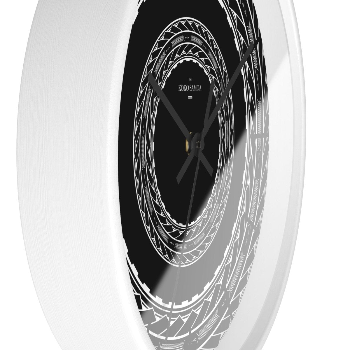 Black 10-inch wall clock with Samoan arrows design, featuring a sleek black base, ideal for home decor in AU, NZ, and USA.