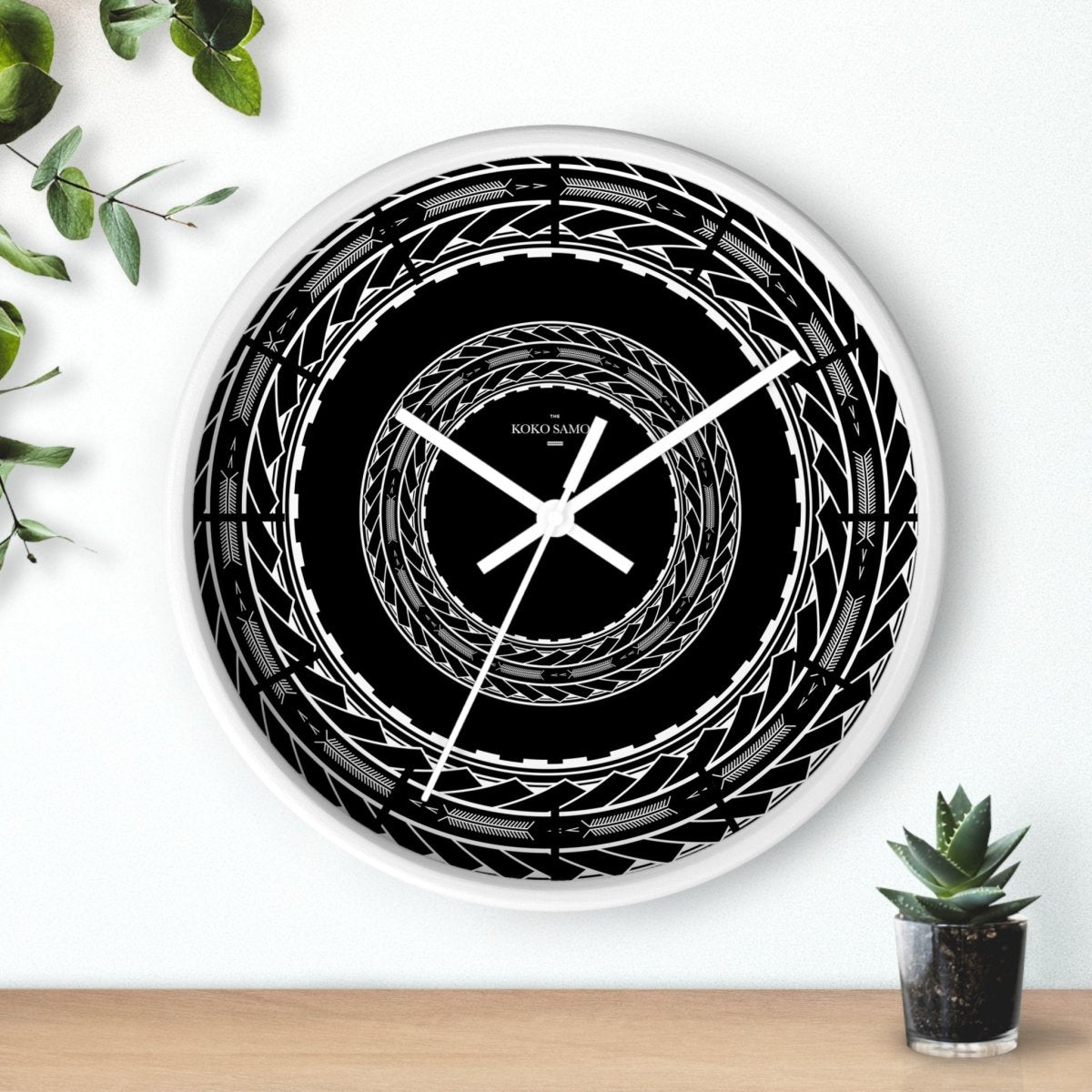 Black 10-inch wall clock featuring Samoan arrows design, ideal for home decor in AU, NZ, and USA.