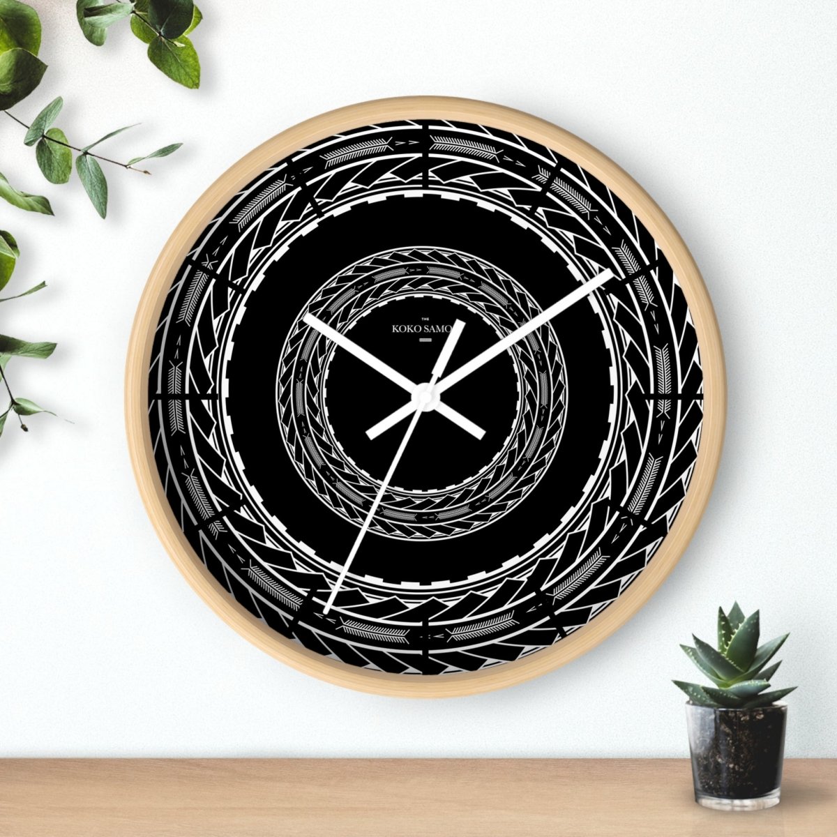 Black 10-inch wall clock featuring Samoan arrows design, ideal for home decor in AU, NZ, and USA.
