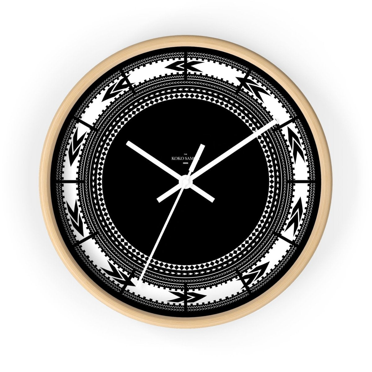 White Pe'a 10-inch wall clock, featuring a sleek design with black hands and base for modern home decor.