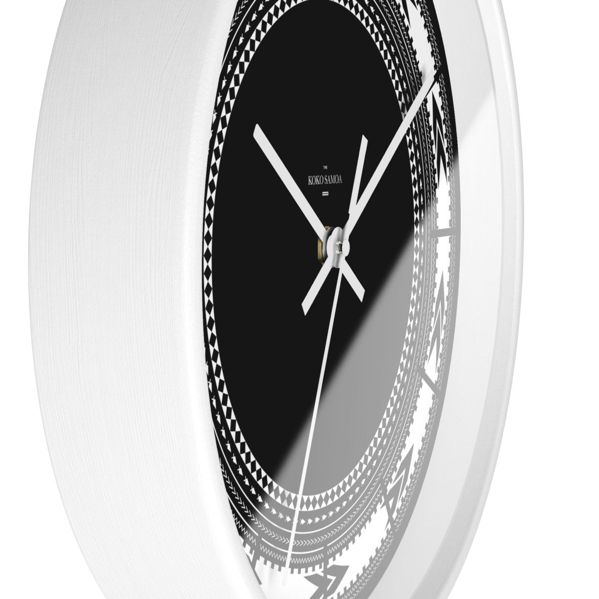 White Pe'a 10-inch wall clock with a black frame, suitable for home decor in AU, NZ, and USA.