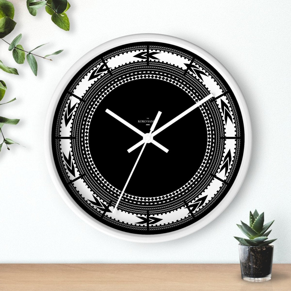 White Pe'a 10-inch wall clock featuring a sleek design, suitable for home decor in AU, NZ, and USA.