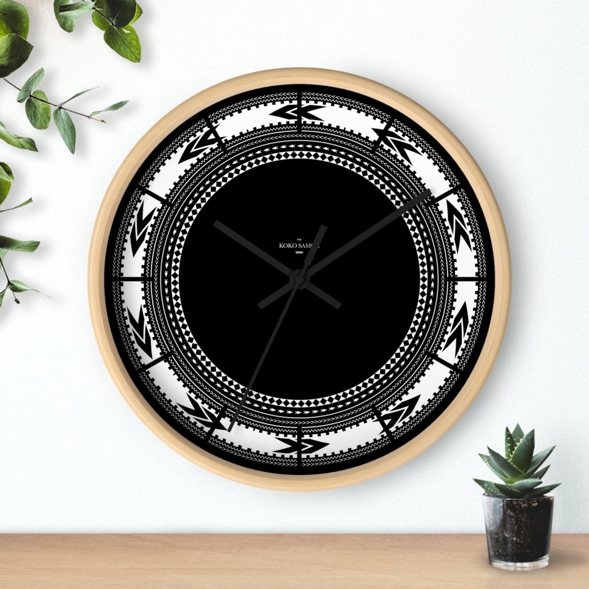 White Pe'a 10-inch wall clock with black hands and black base, ideal for home decor in AU, NZ, and USA.