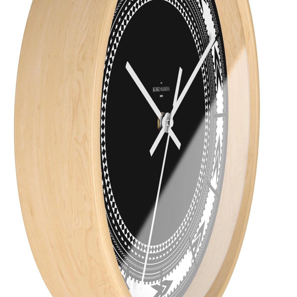 White Pe'a 10-inch wall clock featuring a sleek design with a black base for home decor.