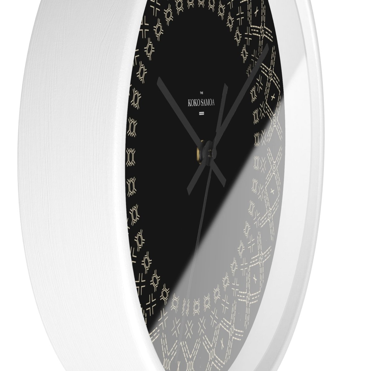Black and white 10-inch Malu wall clock, featuring a modern design for home decor in AU, NZ, and USA settings.