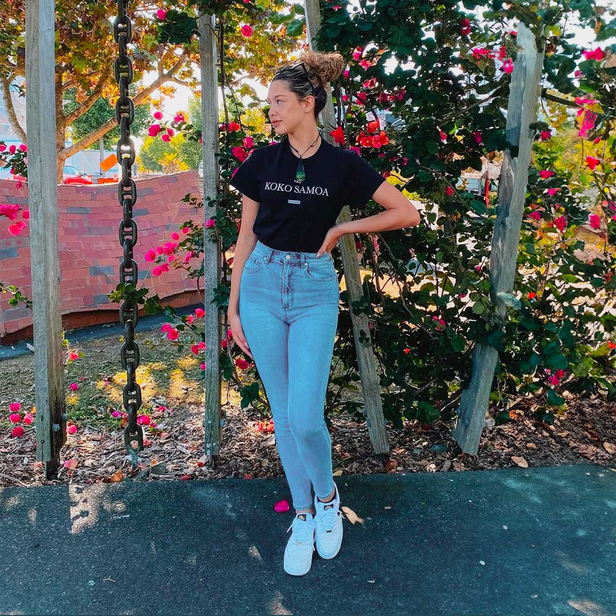 Black unisex heavy tee by Monster Digital, showing a soft, comfortable fit with "The Brand Classic" print in XS size.