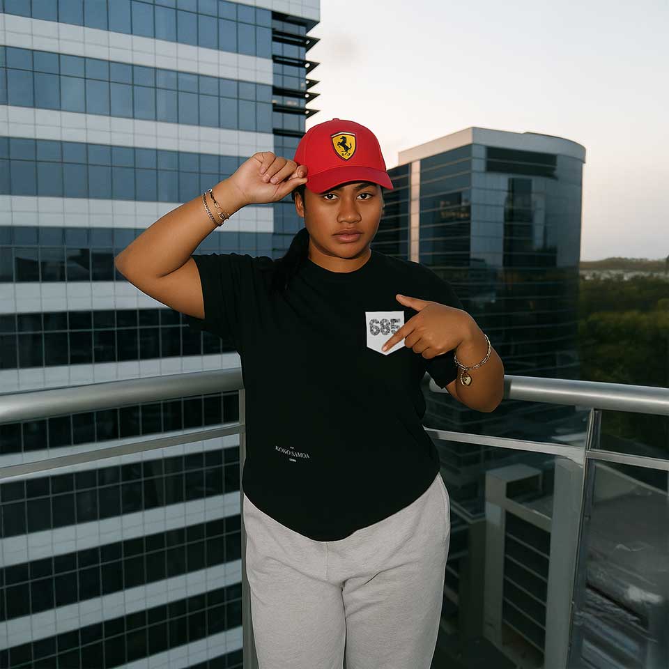 Unisex soft tee by The Print Bar with '685 Pocket' print in army green, shown in XS size on a model.