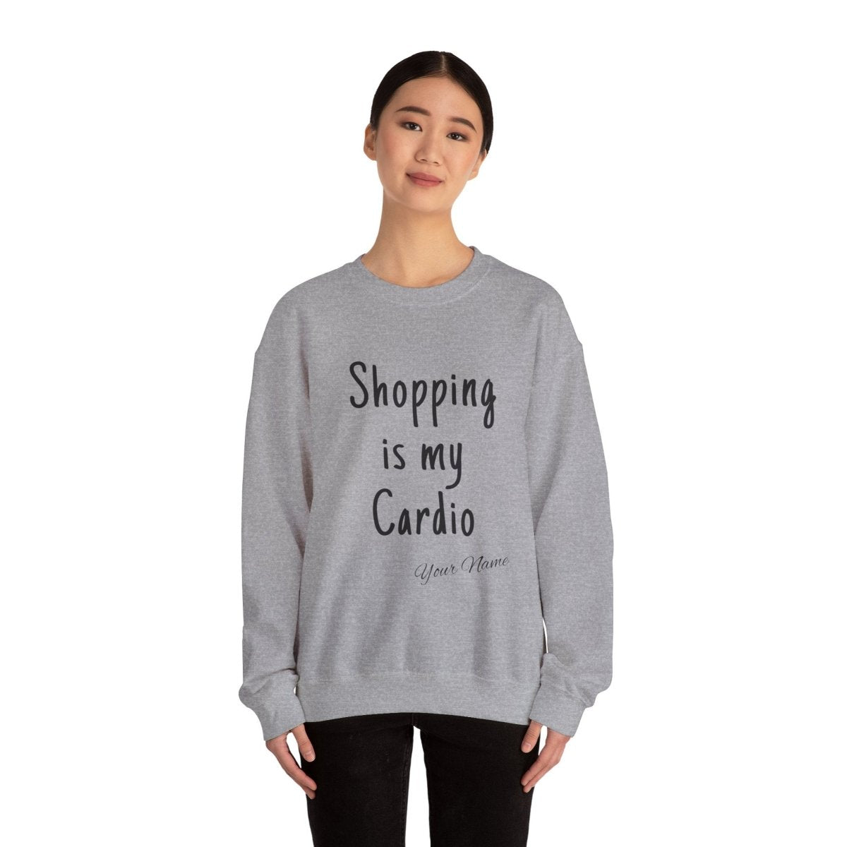 Unisex heavy sweatshirt with "Shopping is My Cardio" print, casual style, in a neutral color.