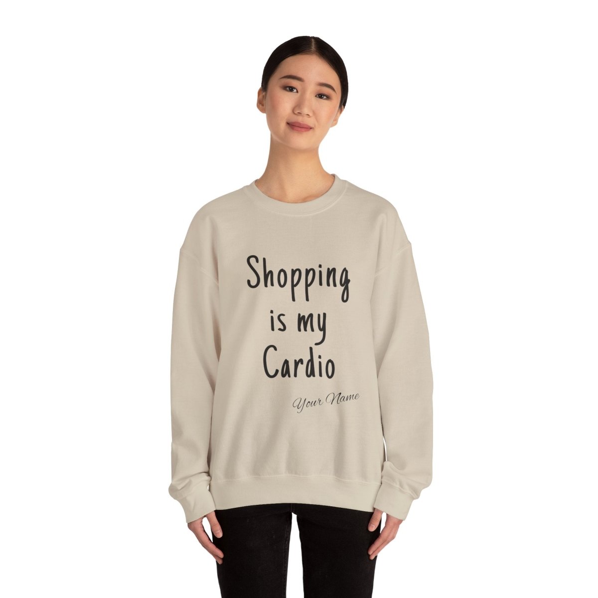 Unisex heavy sweatshirt with "Shopping is My Cardio" print, featuring casual fit and comfortable fabric.