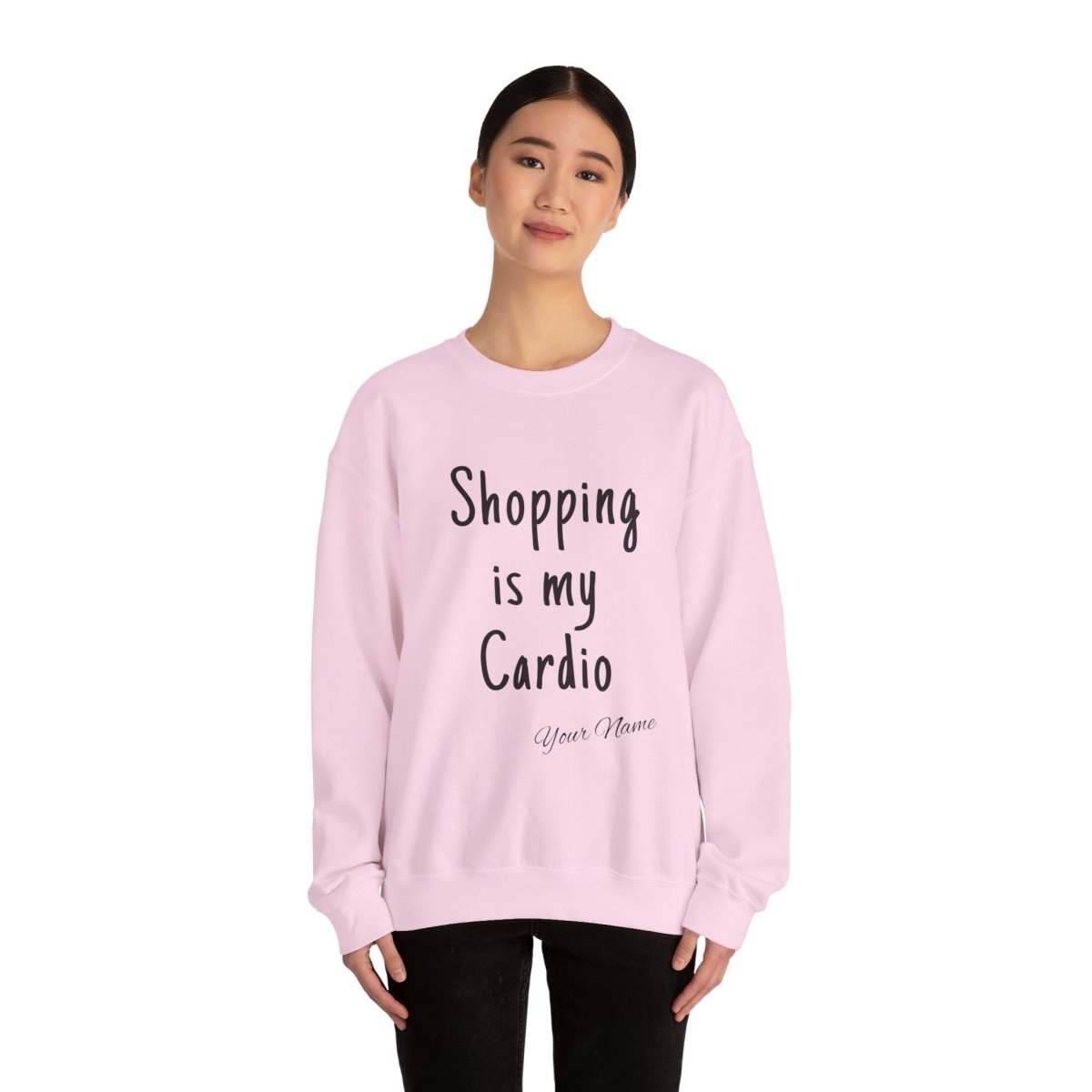 Unisex heavy sweatshirt with "Shopping is My Cardio" printed, branded, in black fabric.