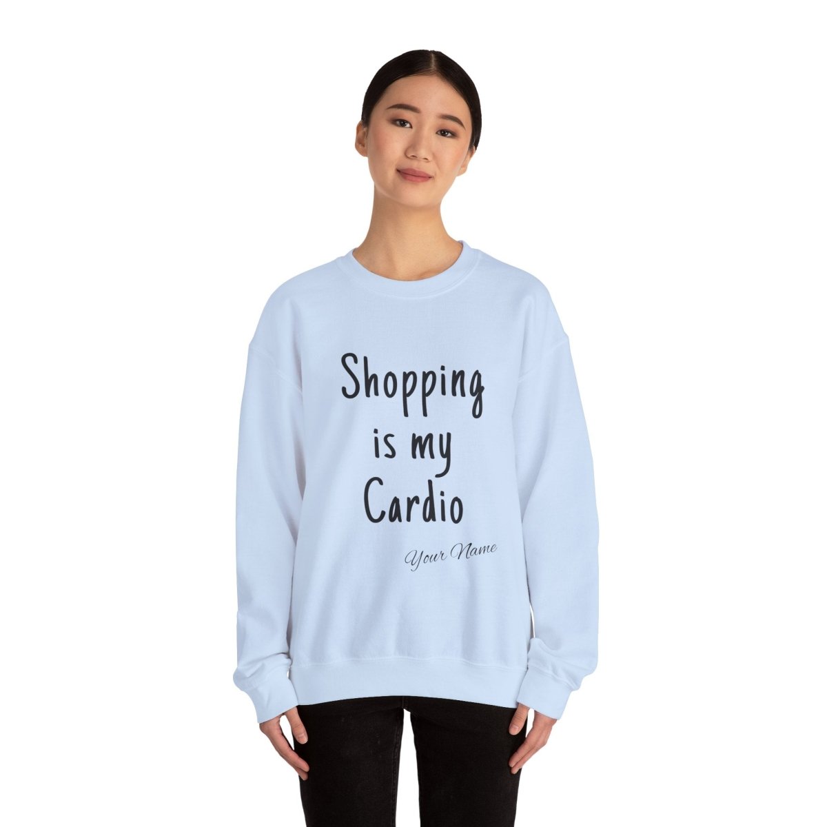 Unisex heavy sweatshirt with "Shopping is My Cardio" slogan, in a cozy, casual style.
