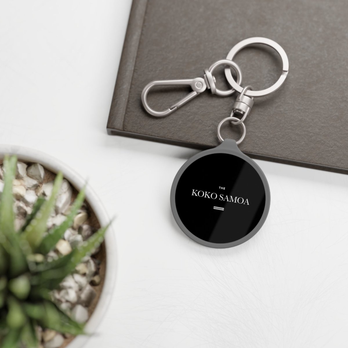Grey keyring tag from WOYC's The Brand Classic collection, featuring USA-themed home decor accessory.